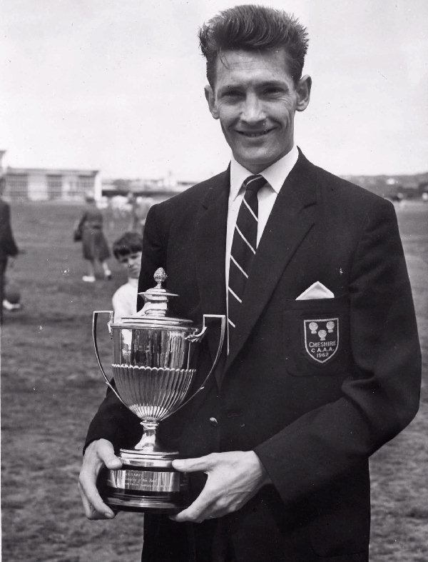 Wallasey Sports Personality of the year, 25 year old Kevin Mather of Wallasey A.C., pictured here with the Marples Trophy, presented to him by Mr E. Marples (Minister of Transport) at the Leasowe Road playing fields.